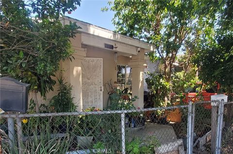Photo of 6300 Holmes Avenue, Los Angeles, CA 90001 (MLS # MB25113528)