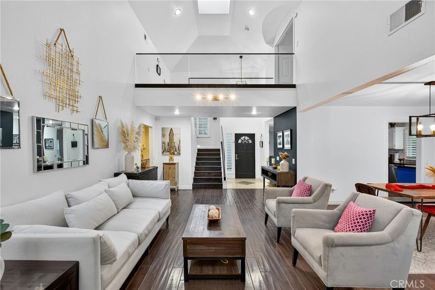 Best Value in Valencia Summit!



Highly sought-after Chelsea model located on a quiet cul-de-sac in the prestigious Valencia Summit. This 3-bedroom, 3-bath home spans over 2,100 sq. ft. and features a soaring two-story living room with high ceilings, rich wood flooring, and abundant natural light. The updated granite kitchen includes custom cabinetry, stainless steel appliances, gas range, and multiple spaces for outdoor dining. A formal dining room with sliding doors makes entertaining seamless. The first floor offers 2 bedrooms, 2 baths, laundry room, and ample storage. Upstairs, the primary suite boasts vaulted ceilings, window seat, and a luxurious bath with dual sinks, marble floors, soaking tub, and separate shower. Wrap-around backyard gives tons of privacy. Community amenities include pools, spas, tennis courts, clubhouse, picnic areas, and scenic trails. Conveniently close to Valencia Town Center, COC, CalArts, dining, shopping, and freeway access.