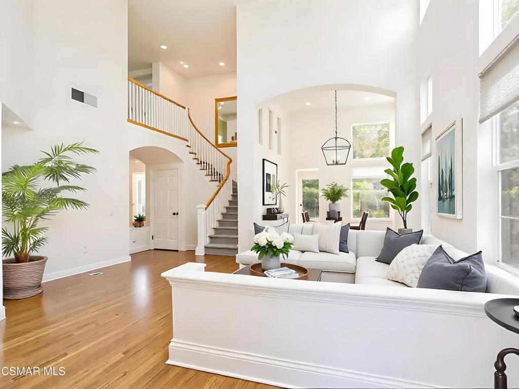 This is the home you have been waiting for in Regency Hills! Located on one of the most COVETED private streets in the development. Gorgeous pool home with a view! Two story ceilings in the formal living and dining room full of light. Kitchen has granite counters and updated appliances with a breakfast nook. Family room has custom built-ins open to the kitchen. 5 bedrooms 4.5 baths. A downstairs bedroom with a full bath plus a guest half bath. Upstairs One of the bedrooms could be a second family room it is so large! The Primary bedroom has a balcony facing the Resort backyard with view of the open area. Step up to a spa retreat bath with a large shower and separate soaking tub. Oak Park Schools! Move in before school starts! The pictures with furniture are AI generated!