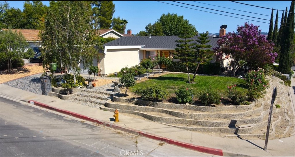 Welcome to this West Hills residence on a huge 15,126 sq. ft. total lot, complete with a separate, gated parcel on Forest Hills Road included in the sale. Has partial views of the city and mountains. This unique property presents a prime opportunity for investors to potentially subdivide and develop a custom home with its own address, construct a spacious ADU, or utilize the space for storage. The existing home features 4 bedrooms and 2 bathrooms, with a master bedroom that includes a full bathroom, and patio doors opening to the pool area. Updated items include the pool equipment, dual-pane windows and doors, central A/C, copper plumbing, and roof. Available for viewing by appointment only.