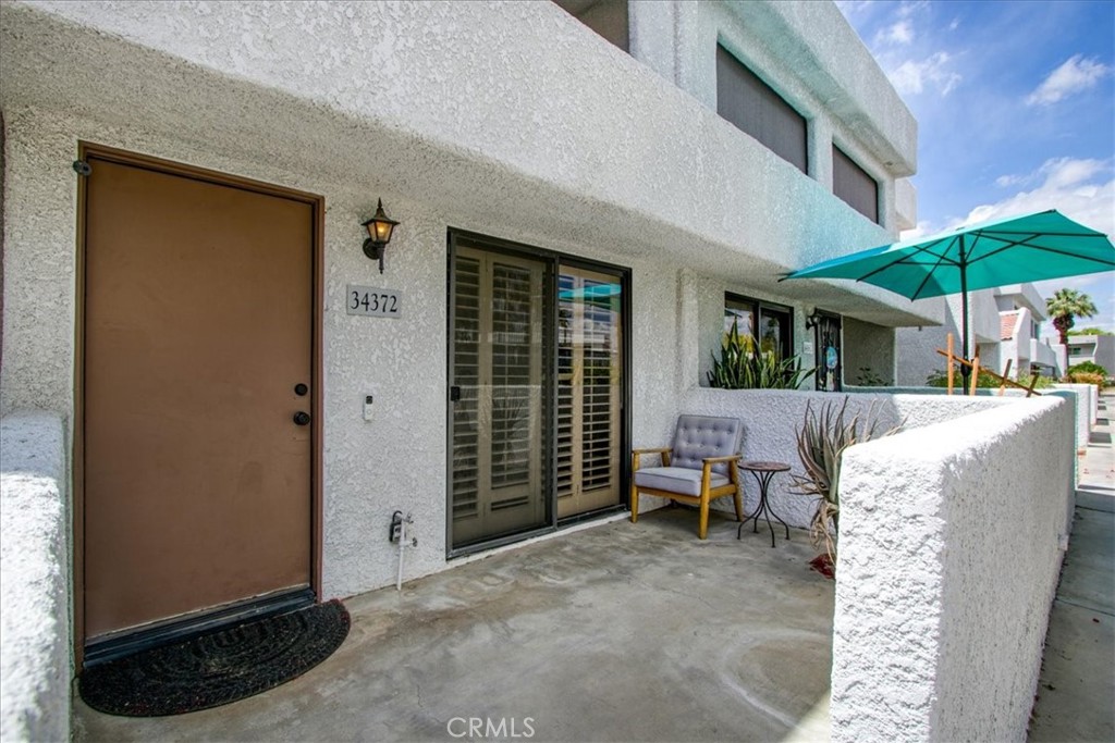 Updated 3-Bedroom Condo in Prime Rancho Mirage Resort Location. Welcome to this beautifully updated 3-bedroom, 2-bathroom condo in the heart of the highly sought-after Rancho Mirage Resort. Offering modern comfort and effortless desert living, this spacious and thoughtfully designed home is the perfect blend of style and functionality. The main level features a bright and airy living room, a full guest bathroom, and a versatile bedroom ideal for guests, a home office, or den. Upstairs, you'll find two generously sized bedrooms—each with walk-in closets—and shared access to a private balcony, perfect for morning coffee or unwinding in the evening. The upstairs bathroom is spacious, stylishly updated, and well-suited for shared living. Step outside to your private courtyard oasis, complete with a built-in wet bar and plenty of room for lounging or entertaining under the stars. The attached 2-car garage provides direct access to the courtyard and includes dedicated space for laundry and storage. Community Highlights: Rancho Mirage Resort is a gated community situated on fee land—you own the land—and features low HOA fees. Enjoy resort-style amenities including two sparkling pools and spas, tennis and basketball courts, and a BBQ area perfect for gatherings and relaxation.
Don't miss this opportunity to own a stylish, move-in-ready home in a prime location with outstanding community amenities!