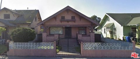 Photo of 1140 W 51st Place, Los Angeles, CA 90037 (MLS # 26831263)