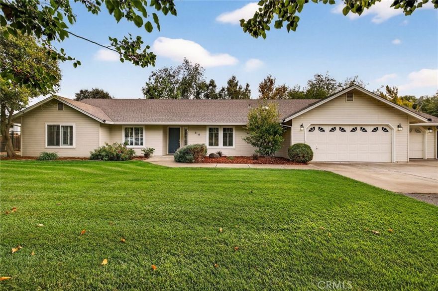 Located on the north side of Chico on a cul-de-sac, this spacious ranch-style home is nicely updated and ready for a new owner.  As you step into the home, you are welcomed by a spacious living room with vaulted ceilings, vinyl wood type flooring, and French doors that lead to the backyard.  The gourmet kitchen includes quartz counters, a breakfast bar, stainless steel appliances, and a gas convection oven.  This home is perfect for entertaining with an open family room off the kitchen with a free-standing wood stove and views of the backyard.  The primary bedroom has its own private access to the back patio, and the primary bathroom has dual sinks, quartz counters, and dual shower heads in the walk-in shower.  Other amenities include a separate dining room, a 3-car garage, spacious bedrooms, an indoor laundry room with a utility sink, ceiling fans, a whole-house fan, dual sinks in the main bathroom, leased solar panels, and a storage shed.  The backyard is fully fenced, featuring RV access, fruit trees, and a nicely sized covered patio perfect for entertaining or relaxing.  Check out this amazing home before it sells!  You won't be disappointed.