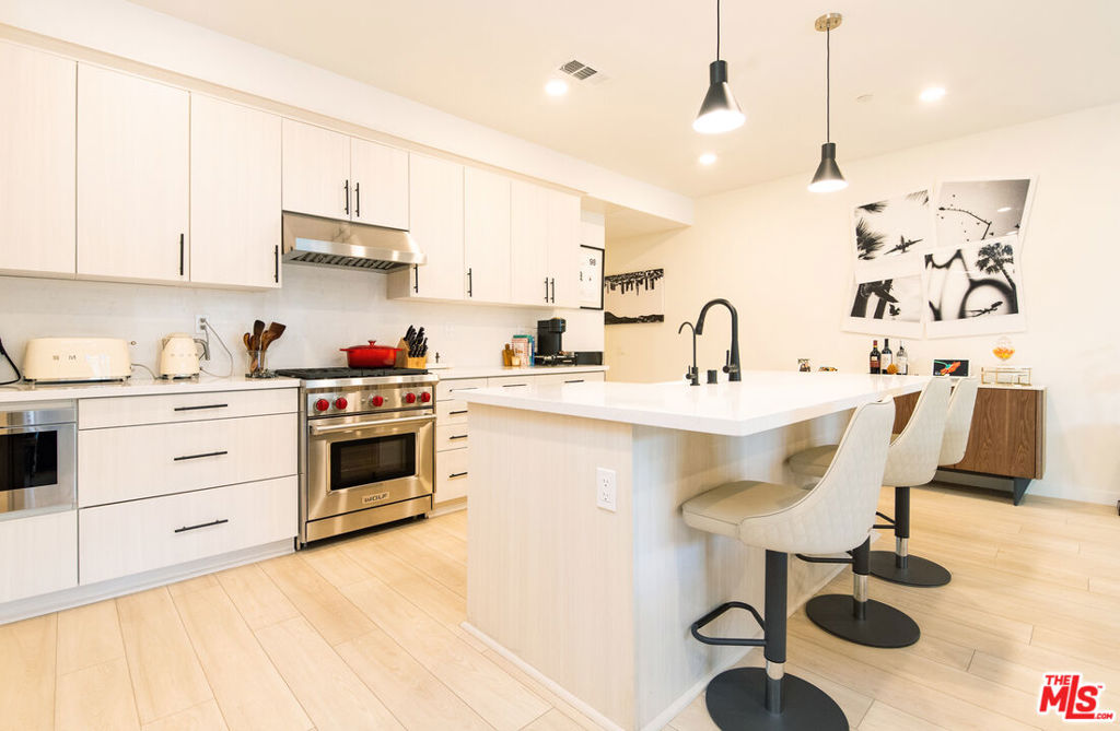 Welcome to 4326 Maple Lane, a beautiful residence in the coveted Lotus Arcadia Development. This modern home offers 2 bedrooms plus a versatile den/office, ideal for working from home or creating a private retreat. The open floor plan is filled with natural light and showcases spacious living and dining areas, along with a contemporary kitchen featuring high-end Wolf range and SubZero refrigerator, perfect for both entertaining and everyday living. Upstairs, the primary suite is a true sanctuary with panoramic views of the San Gabriel Mountains, a spa-inspired bathroom, generous closet space, and motorized window shades for effortless comfort. Thoughtful upgrades include in-unit laundry, a fully paid-off solar system, window shades throughout ($5,000 upgrade) and a whole-house water treatment system ($5,000 upgrade), providing efficiency, sustainability, and peace of mind. Set within a sought-after community and close to Arcadia's award-winning schools, shopping, and dining, 4326 Maple Lane offers not only a home, but a lifestyle at the foothills of the San Gabriel Mountains.