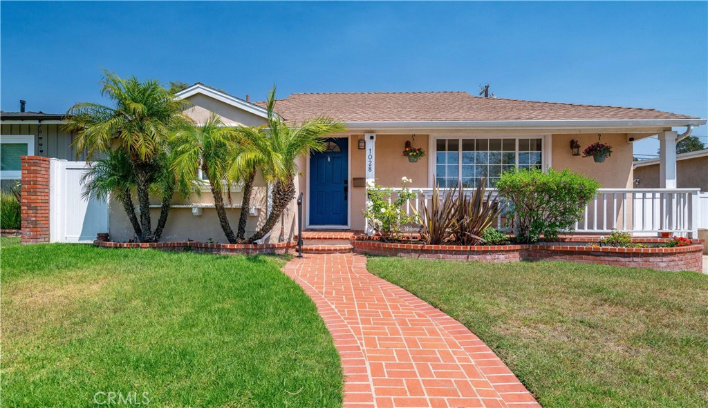 Delightful and Affordable Single-Story Home on a Tree-Lined Street in Prime Torrance Location! Welcome to this beautifully maintained 2 BR., 1 BA., 856 sq. ft. home with great potential to expand in a highly sought-after Torrance neighborhood—full of charm, comfort, and convenience! Enjoy timeless curb appeal with a brick walkway leading to a welcoming front porch. The light-filled living space features original hardwood floors, recessed lighting, and updated windows. The roof was replaced in 2024. The spacious backyard with a grassy lawn and a covered patio is perfect for entertaining, gardening, or relaxing outdoors. Detached two-car garage and a long driveway for extra parking. Located in the award-winning Torrance School District, and just minutes from parks, shopping, dining, and more. Priced to sell.