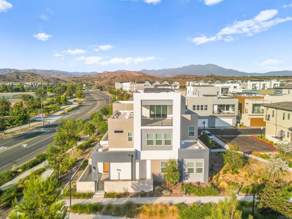 Welcome to 334 Merit, a stunning single-story townhome in the heart of Irvine’s sought-after Great Park community. Built in 2023, this contemporary 3-bedroom, 2-bath residence spans 1,602 sq. ft. and showcases an open-concept layout with modern finishes throughout. The bright and airy living space flows seamlessly into a sleek chef’s kitchen and dining area, perfect for entertaining or family gatherings. The spacious primary suite offers a private retreat with a walk-in closet and spa-inspired bath. A two-car attached garage provides everyday convenience, while the low-maintenance design allows you to fully enjoy the community lifestyle. Residents of Great Park benefit from world-class amenities including pools, parks, playgrounds, sports courts, and vibrant green spaces—all within walking distance. With top-rated Irvine schools, convenient access to shopping, dining, and major freeways, 334 Merit delivers the ideal combination of modern design, comfort, and community living.