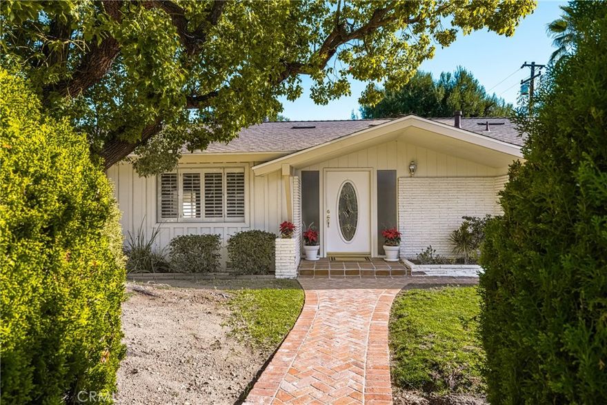 Experience a rare opportunity to own a custom-built home on a desirable corner lot in the prestigious St. Hubert Woods neighborhood of North Tustin. This property features timeless brick walkways and planters, mature landscaping, and a spacious outdoor area perfect for enjoying California’s sunny weather.  Maintained in original condition, the home provides an ideal canvas for personalization or renovation, allowing buyers to create a residence that reflects their vision. The backyard is designed for outdoor living and entertaining, including a sparkling pool, a generous covered patio, and RV parking for extra convenience.  Located within the Tustin Unified School District with a rich tradition of academic excellence, this property combines location, potential, and lifestyle, offering a unique opportunity to own a home in one of North Tustin’s most sought-after communities. With its corner-lot privacy, classic design, and expansive outdoor space, this St. Hubert Woods home is ready to become the perfect canvas for your dream home.  The fourth bedroom has been opened up to the Primary Suite to create a retreat or restore the original wall and recreate the fourth bedroom.