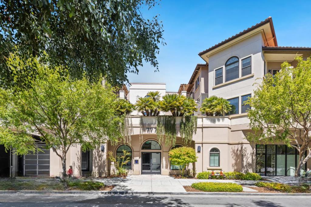 Located in the heart of downtown San Carlos, this stylish 2 bed/2 bath corner unit offers modern living in a secure, boutique building. Enjoy a spacious open floor plan with tall ceilings, hardwood floors, and abundant natural light. The gourmet kitchen boasts custom cabinets, upgraded Dekton Trillium countertops, high-end Kitchen Aid appliances, and a Spektra Black breakfast bar plus access to a private balcony. The primary suite features a large walk-in shower and ample closet space. A generously sized second bedroom and hallway bath round out the main living space. The primary living area opens to a second private balcony. Includes 1 deeded garage spot, EV charging, and access to open space at podium level with sitting area, BBQ and fire pit. Just steps from vibrant Laurel Street shopping/dining, Caltrain, major routes, and top-rated San Carlos schools.