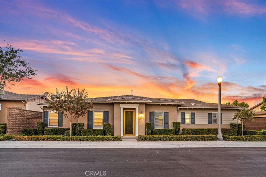 Welcome to 90 Galan Street, a well designed retreat nestled in the heart of gated Gavilan Village in Rancho Mission Viejo. This elegant standalone home offers a perfect blend of comfort and style, featuring 3 bedrooms and 2 bathrooms and no attached walls. Designed with an open-concept layout, the living space flows seamlessly, enhanced by high ceilings and modern LED recessed lighting. Beautiful kitchen boasting white cabinetry,  stainless steel appliances, gleaming granite countertops, a walk in pantry and an expansive island that doubles as a hub for casual gatherings. The adjacent dining area is large enough for a 6 person dining table and flows into the family room.  Your built-in media cabinet is a focal point for the family room and can accommodate an 85" TV for those sports watching gatherings. The home is masterfully designed with privacy in mind positioning the Primary bedroom on one side of the home and the secondary bedrooms on the other side down a hallway. The primary suite is a sanctuary with beautiful chandelier and plantation shutters plus a luxurious en-suite bathroom, featuring double sinks, limestone countertops, an oversized walk-in shower, and walk-in closet. Both secondary bedrooms have overhead chandeliers as well as plantation shutters. They share the full bath with tub/shower combination, framed mirror and quartz countertops. This home is also equipped with a laundry room with upper cabinets, sink and included washer/dryer. The garage has been outfitted with epoxy floors, storage cabinetry and a whole house water softener. Step outside to enjoy the private backyard, beautifully designed with custom pavers and beautiful plants- ideal for hosting friends and family. For recreation, residents benefit from exceptional community amenities steps away at the Hacienda Club including a sparkling pool, relaxing spa, and vibrant club house with clubhouse, workout gym, card rooms and yoga studio.  Residents also enjoy access to all of the amenities RMV has to offer including 2 additional 55+ pools, plus all age Amenities including putting green, firepits, bars, and more. One of the beauties of this home is that Gavilan Sendero offers the lowest rate of Mello Roos in RMV and will be significantly less than the Rienda properties. Yet, you are walking distance to the Sendero Gavilan Amenities and have access to all of the other amenities in all three villages. Experience the best of Rancho Mission Viejo living in this exquisite property.