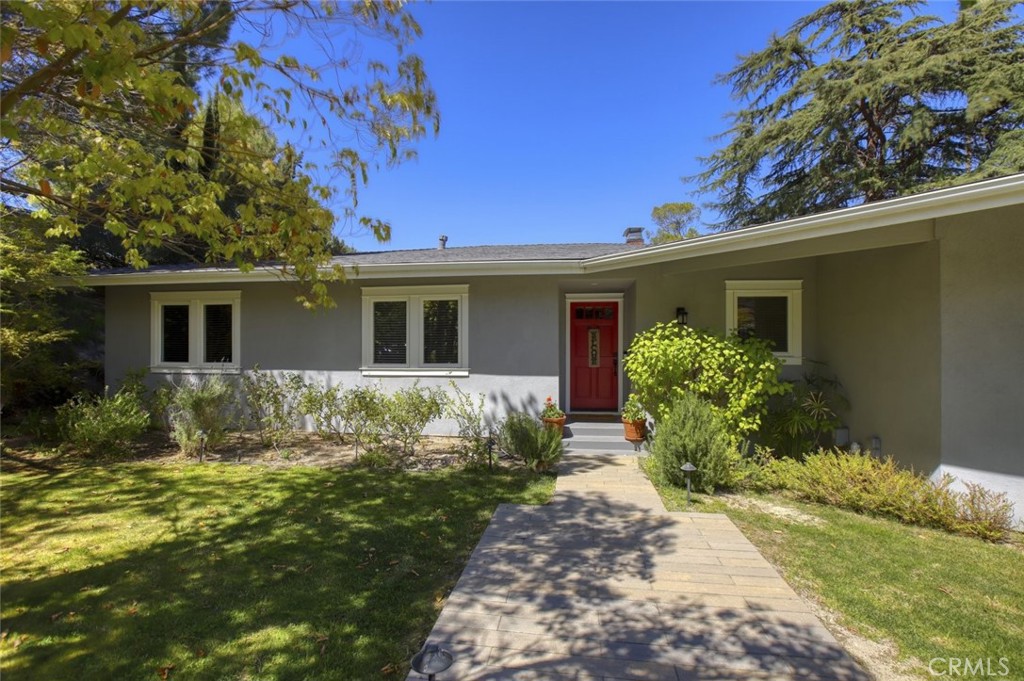Perched on a quiet hillside in Tujunga's sought after Crystal View neighborhood, 7235 Estepa Drive offers a rare blend of privacy, space, and panoramic views. Set on over half an acre, this 3 bedroom, 2 bathroom mid century home spans approximately 2,310 square feet of thoughtfully designed living space. Floor to ceiling windows and an open layout invite natural light throughout, while offering sweeping vistas of the surrounding foothills.
The spacious kitchen opens to the dining and living areas, making it ideal for entertaining or relaxing fireside. Each bedroom is generously sized, and the layout provides both comfort and functionality. Outside, the expansive backyard is a true retreat, complete with a sparkling pool, multiple patio areas, and mature landscaping that adds a lush, private feel.
The large lot also offers incredible potential for an Accessory Dwelling Unit ADU, providing an excellent opportunity for additional living space, rental income, or a private guesthouse, further enhancing the value and versatility of the property.
Located within the Los Angeles Unified School District, this home is served by Pinewood Avenue Elementary, Mt Gleason Middle, and Verdugo Hills High School. All just a short drive from the charm of Montrose, scenic hiking trails, and convenient freeway access, this Crystal View gem is a peaceful canyon escape that doesnt compromise on convenience.