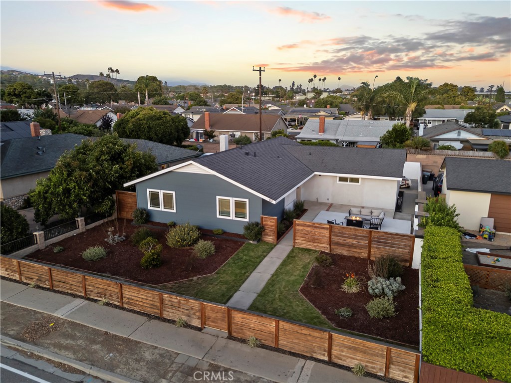 Welcome to Ventura living at its finest! Tired of the Hollywood hustle? Escape to the beach, the sunsets, and the lifestyle you deserve at Victoria Lane. Situated near parks, shops, downtown, and just minutes to the sand, this home has been completely reimagined from the drain to the main—it’s practically brand new. Major upgrades include a brand-new roof, plumbing, underground sewer line to the city main, electrical, furnace, ducting, windows, doors, fencing, gates, patios, sprinkler system, waterlines, and fixtures. Inside, every detail has been thoughtfully designed with today’s trends in mind. The spacious open layout features waterproof LVP flooring, designer lighting, and a statement fireplace with shiplap and custom tile. The kitchen is a true showstopper with quartz countertops, a massive island perfect for cooking, dining, or entertaining, brand-new appliances, and endless storage. Both bathrooms have been fully remodeled with custom tile, sleek vanities, and a Jack & Jill layout connecting the bedrooms for ultimate convenience. If outdoor living is your vibe, this home delivers. The private front patio is surrounded by lush landscaping for a peaceful retreat, while the backyard covered patio offers custom color-changing lighting—ideal for dinner parties, game nights, or dancing under the stars. Practical features include a two-car garage, additional parking with room for a boat or toys, and private alley access. With all major systems updated, this home offers peace of mind plus modern style. This is more than a home—it’s a Ventura lifestyle. Sun, surf, and vibrant coastal energy are waiting for you. Don’t miss your chance to own one of the most stylish and move-in ready homes near the beach!