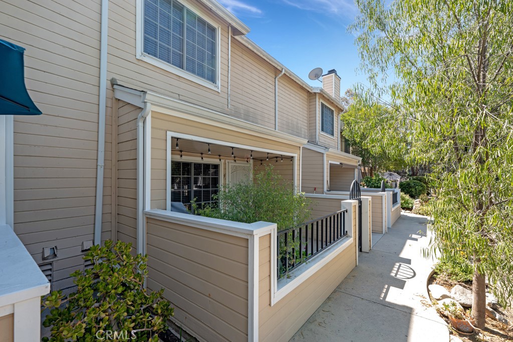 Welcome to this beautifully designed townhouse filled with an abundance of natural light, highlighted by skylights that brighten the spacious living areas. The well-appointed kitchen features a huge pantry, perfect for all your storage needs. The home boasts a luxurious master suite and a mini suite, both offering walk-in closets for ample organization. You'll also find generous linen storage throughout the home, and a Nest thermostat for modern comfort and energy efficiency. Enjoy the convenience of an attached 2-car garage with plenty of built-in storage and washer/dryer hookups. Nestled in a quaint and quiet community, residents can relax and unwind at the community pool and spa—a perfect retreat just steps from your door. This home offers the ideal blend of comfort, functionality, and peaceful living. Don’t miss the opportunity to make it yours! VA Approved!!