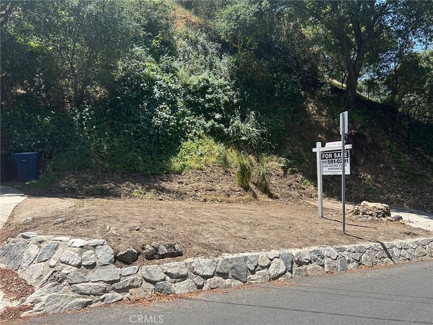 $50,000 reduction from original asking price.  Paved Street with Utilities Available. This is Burbank. Close to major studios and production facilities. Easy access to Burbank Airport and the 5 freeway in any direction. The last easily buildable lot on Country Club Dr.  Owned by the same family for 30 years, it is now available for someone to create their dream home. Country Club Drive is a storybook canyon road at the east end of Burbank that reaches into the foothills. Feels like you are living on a country lane, but just minutes from Downtown Burbank.  This lot is flat at the street with an upslope at the rear.  Paved street with utilities and homes on either side.