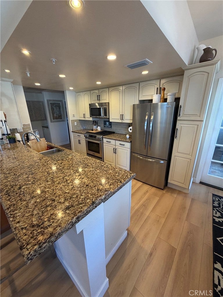 4591 Warner Ave. 105