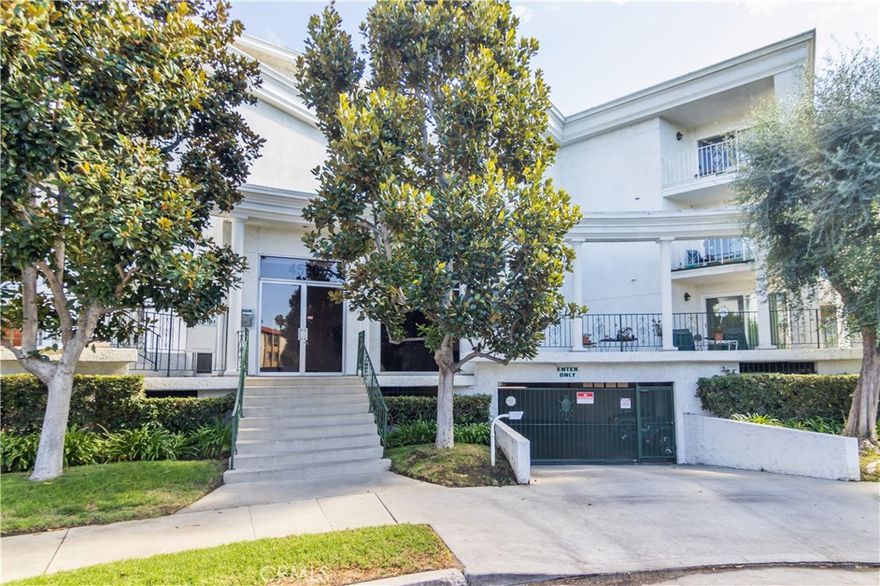 Welcome to this elegant Southern-style building, framed by stately columns and surrounded by graceful magnolia trees. Inside, discover a beautifully remodeled 2-bedroom, 2-bath condo that perfectly balances modern style, comfort, and convenience.

Located just moments from Ventura Blvd’s premier dining, shopping, and entertainment, this home offers the best of Sherman Oaks living — vibrant city energy paired with a relaxed neighborhood feel.



The interior features hardwood and tile floors throughout, with rich natural wood in the living and dining areas and sleek tile in the kitchen, baths, and hallway. The chef-inspired kitchen stands out with stainless steel appliances (including a refrigerator), gray quartz countertops, a raised breakfast bar, and ample cabinetry — ideal for both everyday living and entertaining.

An open-concept layout flows seamlessly into a spacious living area highlighted by crown molding and modern lighting. A central hallway separates the two generous bedrooms, each offering ample closet space and tastefully updated finishes. Every detail has been thoughtfully designed to create a home that feels both elegant and move-in ready.



Enjoy resort-style amenities including a sparkling community pool, two assigned parking spaces in the secured subterranean garage, and convenient on-site laundry facilities. Water and trash services are included for added ease.

Experience Southern charm and modern living — all in one exceptional Sherman Oaks residence.