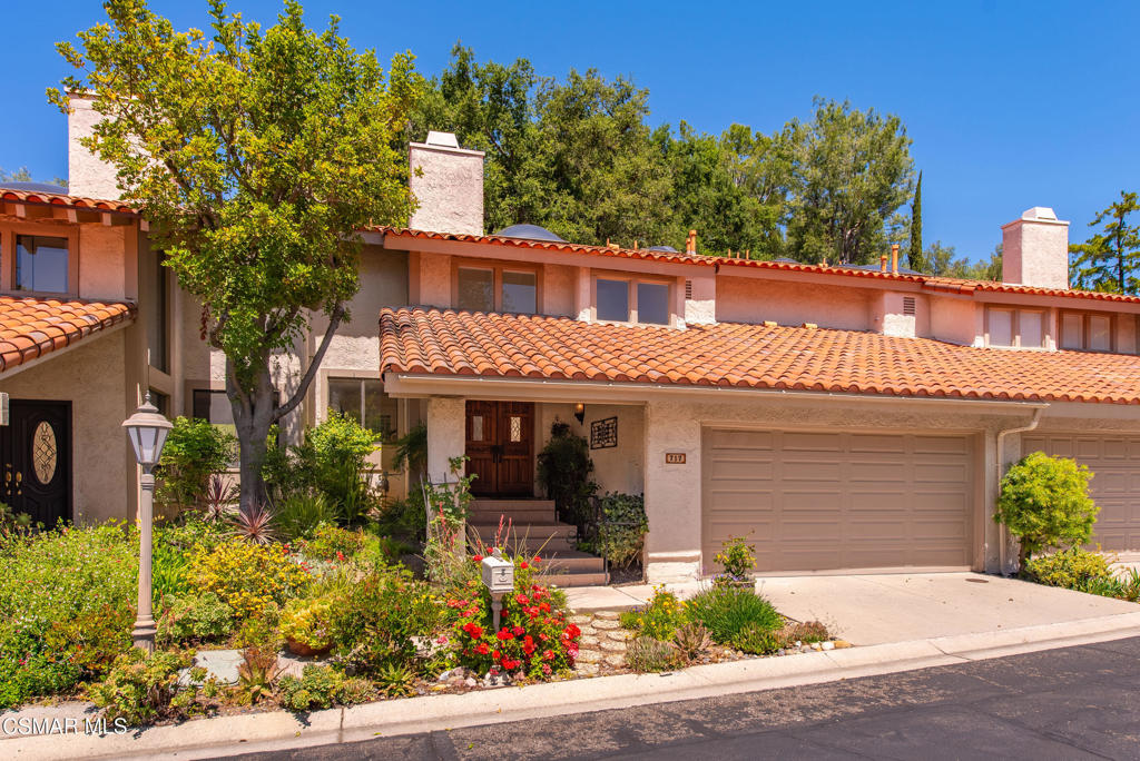 Welcome to this beautifully updated 3-bedroom, 3-bathroom townhome in the highly desirable Northgate community of Westlake Village. Located within a secure gated community, this home offers a perfect blend of comfort, privacy, and charm. As you enter, you are greeted with high ceilings and abundant natural light that pours in through a large skylight that enhances the room's open, airy feel. The home features fresh paint and brand-new carpet throughout, spacious living and family room areas and an updated kitchen, featuring granite countertops, newer stainless steel appliances, and a bay window overlooking the garden.The home offers generously sized bedrooms, including a luxurious primary suite complete with a double vanity, a large walk-in closet, an en-suite bathroom, and high ceilings.Enjoy the peaceful ambiance of your private backyard oasis, complete with a lush garden and tranquil hillside views perfect for relaxing or entertaining in a serene, natural setting.Close to top rated schools, restaurants and shopping.