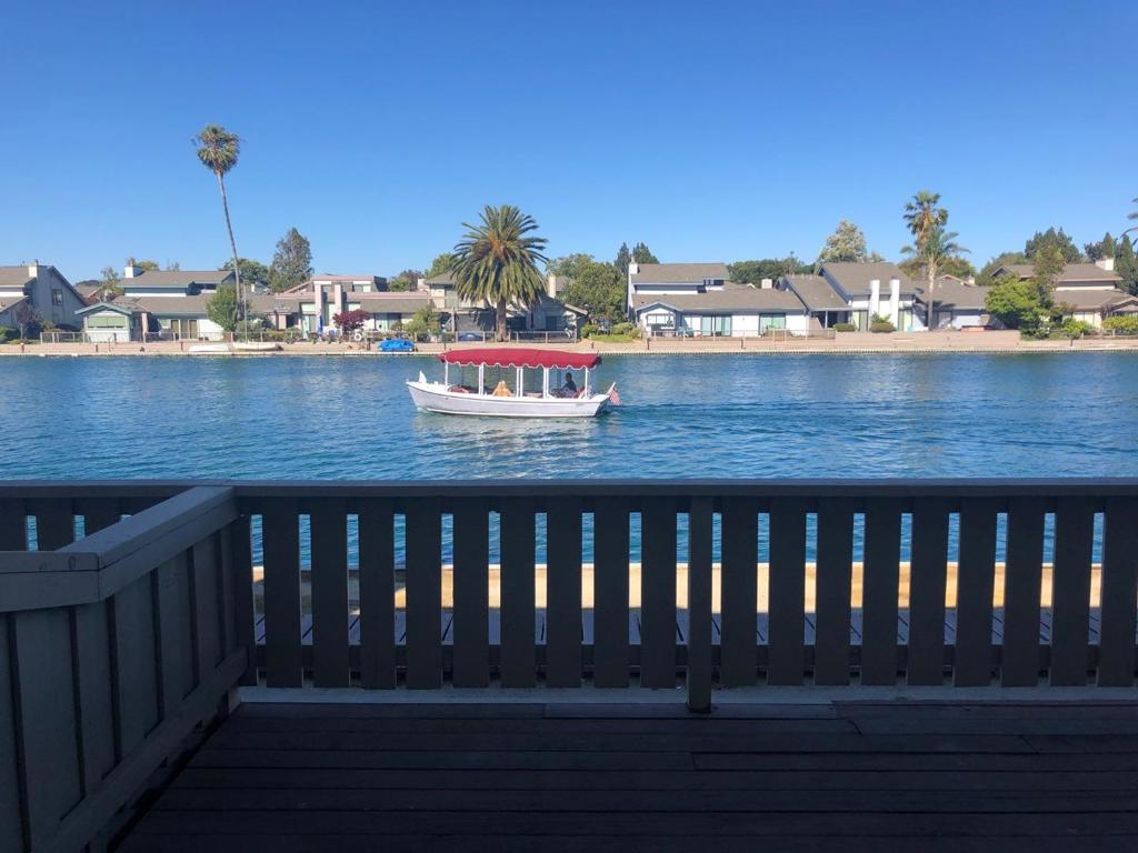 Fabulous Wide Water Views from your patio! 3 bedrooms, 2.5 baths with approximately 1546 sq. ft. of living space. Direct access to the waterway which offers sailing, paddle boarding, kayaking and canoeing! Updated kitchen and baths, with washer dryer in the Townhouse. Living room/ dining room combo w wood burning FP. Enjoy water views also from LR/DR and master bedroom! 1 Car Garage with 1 Car carport. Community area includes, community clubhouse, pool, jacuzzi, children's play area and tennis court. Easy access to parks, shops, restaurants . Easy commute to SF or Silicon Valley. Top Rated Schools! Pet allowed!