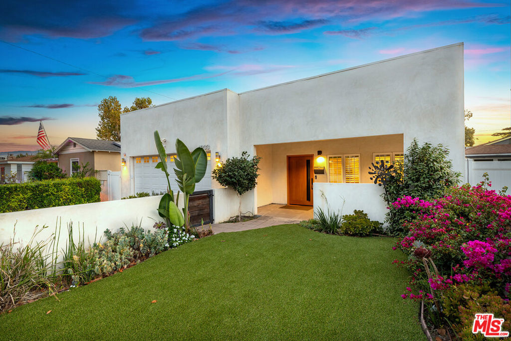 Magnolia Park Modern Pool Home with Solar! Experience the perfect blend of style and comfort in this modern Burbank retreat. Designed with a minimalist aesthetic, the home features a spacious living room, open dining area, and a chef's kitchen with striking black-and-white cabinetry, quartz countertops, glass tile backsplash, and a huge island. High-end stainless steel appliances, gas range, skylight, and French doors open seamlessly to the pool area and landscaped yard.With three generous bedrooms, there's plenty of room for family, guests, or the ideal home office or gym. Elegant hardwood flooring, plantation shutters, and recessed lighting add warmth and sophistication throughout. Both bathrooms have been tastefully remodeled with high-end finishes.The private backyard is an entertainer's dream, complete with sparkling pool, hot tub, and waterfall. A covered front patio overlooks a walled garden, while the back patio transforms into an indoor/outdoor living space with a smart see-through garage door enclosure.Additional highlights include seller-owned solar panels with emergency power bank, EV charger, new pool heater, security system, and fruit trees - orange, lemon and keylime. Near the Chandler Bike Path and Magnolia Park restaurants and boutiques and located in the coveted Roosevelt, Luther, and Burroughs High School district... this home has it all!