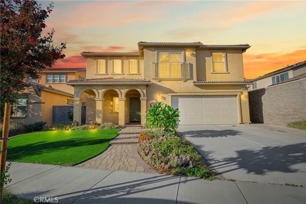 Welcome to 11081 Clear Lake Lane in the desirable Barrington Place community of Jurupa Valley! This beautiful two-story home built in 2019 offers 4 bedrooms, 3 full bathrooms, and 2,769 square feet of living space.
The open-concept floor plan features a spacious kitchen with granite countertops, upgraded cabinetry, and stainless steel gas appliances. The main level includes a full bedroom and bath—perfect for guests or multi-generational living. Throughout the home, enjoy waterproof laminate flooring, plantation shutters, ceiling fans, and a QuietCool whole-house fan for added comfort.
Additional features include a tankless water heater, Ethernet network wiring, Smart Home technology with SkyBell video doorbell, August smart lock, and a LiftMaster WiFi garage opener.
Outside, the home offers a fully landscaped front and backyard with synthetic turf, drought-tolerant plants, and no rear neighbor, creating a private setting with open mountain views. The covered concrete patio and elevated pad make it ideal for outdoor entertaining.
The community features a resort-style pool, spa, playground, basketball court, and walking track. Located near Limonite Avenue and Wineville, this home provides easy access to the 15, 60, and 91 freeways, shopping, restaurants, and parks.
Energy-efficient solar panels and a low monthly HOA fee make this home both affordable and eco-friendly. Buyer will assume Solar PPA upon close.