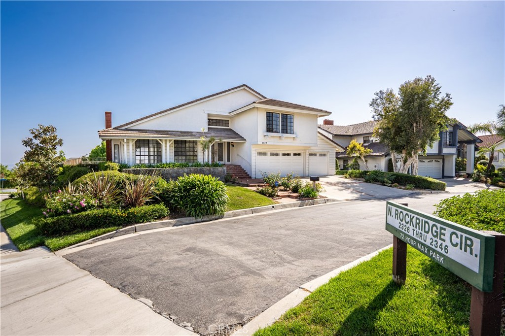 Don’t miss this beautiful home with spectacular views to Catalina in the highly sought after Summit View neighborhood in the Orange Foothills. This amazing home sits on a prime corner lot in a quiet neighborhood with unobstructed multi-million dollar views! As you enter the home, you are greeted by soaring ceilings and an oversized living room with sunken conversation area with fireplace. The formal dining room overlooks the pool with amazing Catalina and city lights views. The spacious kitchen has all the amenities including built-in refrigerator and chef-quality Thermador oversize cooktop, island and casual dining area. Breakfast will be breathtaking every morning with sliding doors leading to the covered wooden deck and patio. Guests can overflow into the HUGE downstairs family room with a full bar, fireplace and patio doors leading to the pool, spa and stunning views clear to the Ocean. Upstairs you’ll find the gorgeous multi- level master suite with room for a study, sitting area and more. Master bath is all custom stone with built-in island, dual sinks, soaking tub and shower. EVERY WINDOW in the master quarters appreciates the dramatic views. Two more large bedrooms round out the upstairs with a Jack and Jill full bath! This home has it all and is perfect for a family. It is a Masterpiece and the Gem of the neighborhood! Close to shopping, award winning schools and more! Don't miss out!