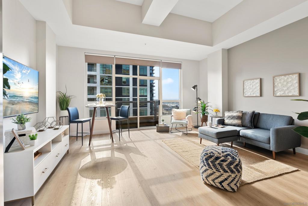 Calm luminous westerly facing luxurious furnished 10th floor Little Italy studio! Tall ceilings with stunning water and city views. Enjoy stunning sunsets from the large Bay facing windows. Close to award winning restaurants, Play bocce ball with the neighbors. Load up on fresh flowers and produce at Saturday Farmer's Market. Cleaning service is included so you have more time to enjoy Little Italy. Juliette balcony, abundant closet space, wood laminate floors, new appliances, washer/dryer, storage unit conveniently located on the same floor. Pets welcome with approval.