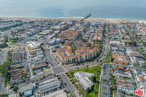 Photo of 415 Townsquare Lane #325, Huntington Beach, CA 92648 (MLS # 26664771)