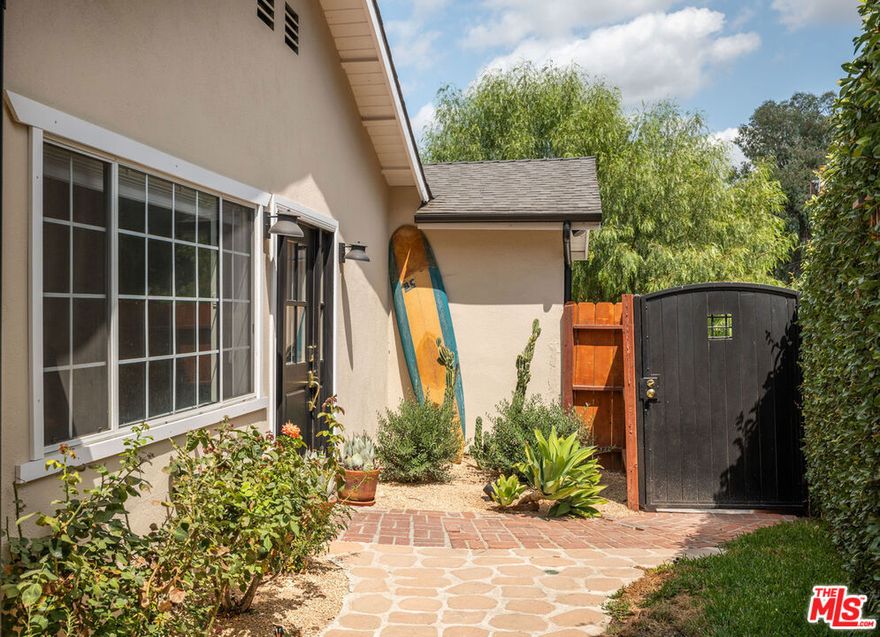 California charm meets modern convenience in this stunning home south of Ventura Boulevard in prime Woodland Hills. Nestled on a 6,272 sq. ft. lot, this newly updated residence offers an inviting, bright and airy open floor plan re-designed for comfort with style and practicality. Inside, you'll find 3 spacious bedrooms and 2 beautiful bathrooms, an ample kitchen with breakfast bar, a warm living/dining space with a cozy fireplace, flooded with natural light. Step outside to your private backyard retreat, complete with a sparkling pool, lush landscaping, perfect for entertaining or unwinding with tranquil canyon views. The 2-car attached garage adds everyday convenience. Located just minutes from premier shopping, dining, freeways, and award-winning schools, this compelling offering has it all and in an unbeatable location.