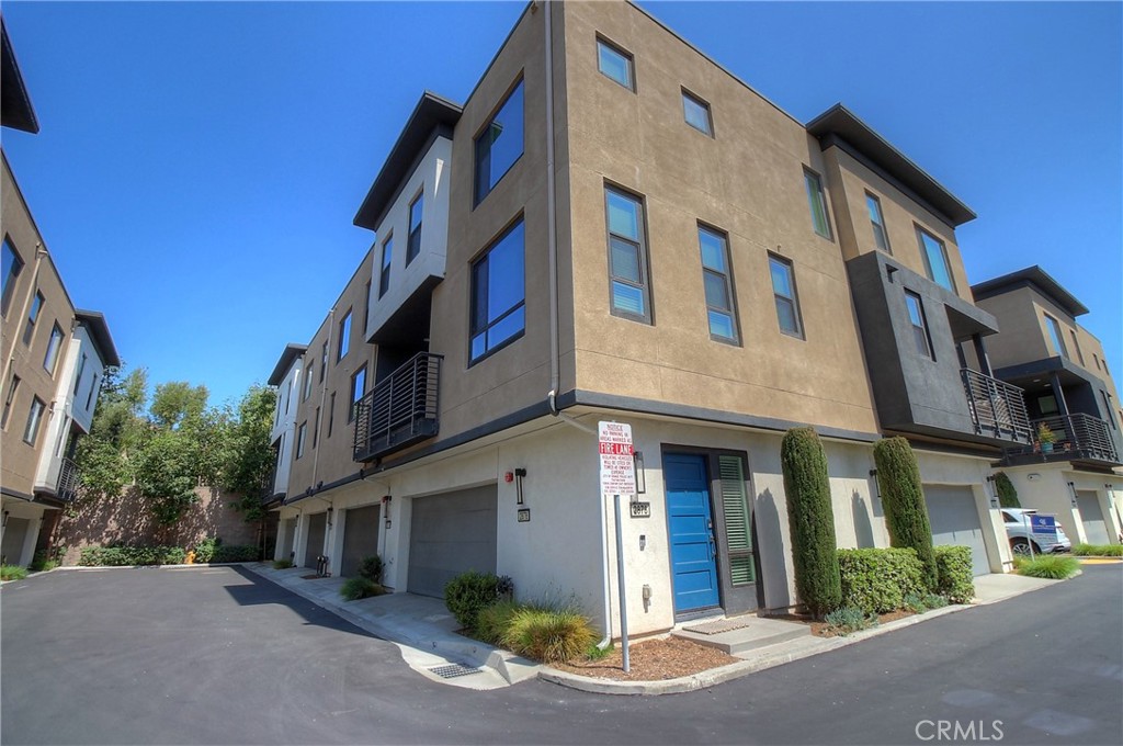 Welcome to this bright and stylish corner-unit home in the heart of Orange! In this beautiful condo, you will find an airy open floor plan with high ceilings, recessed lighting, and upgraded laminate vinyl plank flooring. The light-filled living and dining areas flow into a gorgeous kitchen with Quartz countertops, glass backsplash, center island, walk-in pantry, and stainless-steel appliances. Relax on your private balcony or retreat upstairs to one of two spacious ensuite bedrooms, including a primary with walk-in closet and spa-like bath. Enjoy the convenience of indoor laundry with washer/dryer, a two-car attached garage, and modern upgrades like a tankless water heater and dual-pane windows. Community perks include a dog park, fire pit, and BBQ area—perfect for entertaining. Close to parks, shopping, dining, award-winning schools, and easy freeway access.
