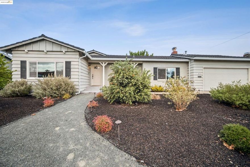 This 4-bed, 2-bath single-story home boasts 1,700 sq. ft. of stylish, functional living space. Step down into the family room as you enter, or head straight to the pantry for a snack. Updated flooring and renovated kitchen set the tone, while a smart floor plan makes everyday living a breeze. From the living room, enter the backyard and discover your own retreat — a screened-in Florida room for year-round enjoyment and lush, mature orange trees you’ll love picking from. 4 bedrooms allow for flexibility with a primary featuring double closets, double vanity and bathroom storage. The pass-through garage is perfect for extra parking or flexible storage. Lovingly cared for and ideally located near schools and shopping, this home blends comfort, convenience, and charm — ready for you to move right in!