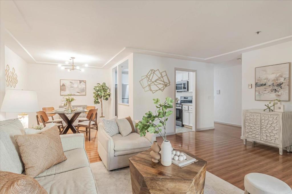Welcome to this fabulous 3-bedroom, 2-bath condo, featuring gleaming laminate flooring throughout. The spacious living room opens to a covered patio, offering a perfect space for relaxation. The beautifully updated kitchen showcases Quartz countertops, stainless steel appliances, and a large dining area, ideal for gatherings. Both bathrooms have been tastefully updated with new vanities and fixtures. The master suite features a walk-in closet, providing ample storage. This home is equipped with a thermo-film radiant ceiling system, ensuring even temperature distribution, no air movement, no noisy fans, and individual room controls for comfort and ease. You'll also find an in-unit laundry room and plenty of closet and storage space for added convenience. Located just minutes from Stanford University, Stanford Hospital, and the Stanford Shopping Center, this home is close to major tech companies like Google and Microsoft. Plus, it's in the award-winning Palo Alto school district, with Briones Elementary, Fletcher Middle, and Gunn High School nearby.