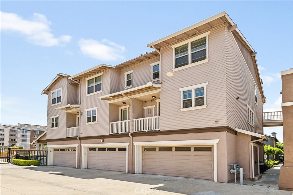 *SELLER IS OFFERING $10k CREDIT TO BUYER FOR CLOSING COSTS OR RATE BUY DOWN (exclusions apply)* Welcome to this lovely Tri-Level Townhome in the Heart of Monrovia! Thoughtfully upgraded and well maintained, this 3-bedroom, 3-bathroom home offers a spacious and versatile tri-level layout in a charming, gated community. The entry level features a private bedroom-ideal for guests, a home office, or personal gym, full bathroom, and direct access to a 2-car garage. On the second level, the main living area features a cozy fireplace, private balcony, and a formal dining space. The large kitchen boasts granite countertops, freshly refinished cabinetry with updated hardware, and a convenient in-unit laundry area. The third floor hosts two en-suite bedrooms. The primary suite features a large closet, new double-sink quartz vanity, and its own private balcony with separate exterior access. Additional features include brand-new waterproof vinyl flooring throughout, modern quartz vanities with new mirrors and light fixtures in all bathrooms, dual-pane windows, and central A/C and heating for year-round comfort. Ideally located just minutes from the Gold Line Station, Westfield Santa Anita Mall, Old Town Monrovia, and easy access to the 210 and 605 freeways. Bordering the city of Arcadia, this is a true gem in a prime location!