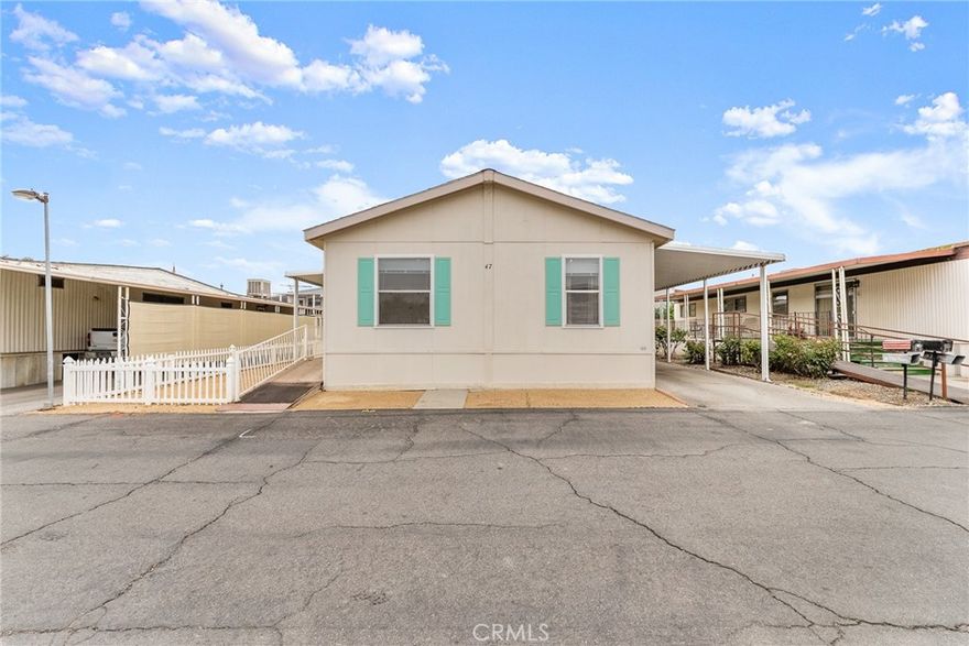 Rare Find in 55+ Community!  Spacious, Updated, Yucaipa Beauty, with 3 Bedrooms, 2 bathrooms. This home features, Newer Water Heater approx 3 mos., Newer A/C  approx 1 yr., updated light fixtures and hardware plus a fully fenced yard! All in a well maintained community with pool/spa and LOW space rent! This IS A MUST SEE!