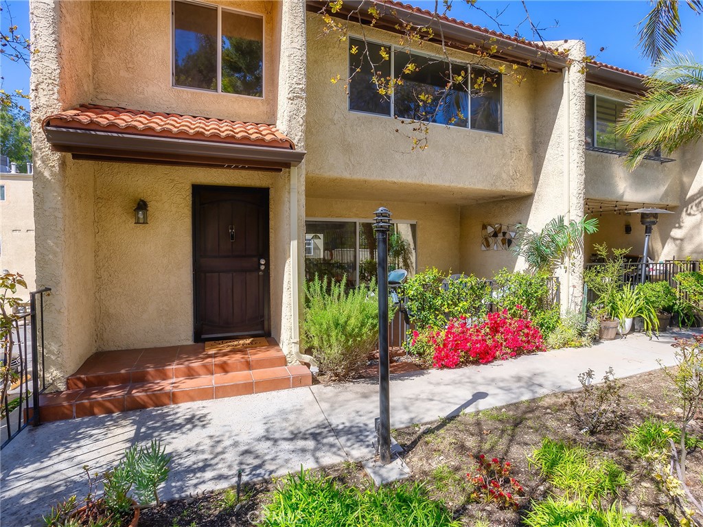 Great Cabrini Villas Townhome for sale! This 4-bedroom, 2-bathroom home features fresh paint, a formal dining room, and a remodeled kitchen. Enjoy a private patio and a 2-car attached garage with direct access. The resort-style complex offers multiple pools and jacuzzis, tennis courts, a sports court, a playground, a dog park, a clubhouse, and 24-hour patrolled security. Conveniently located just a short drive to freeways, restaurants, shopping, and entertainment. Central heat and air. Plenty of guest parking! Owner will consider carrying the loan.