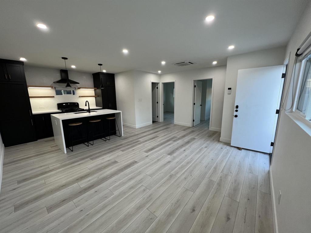 This fully renovated multi-unit property offers exceptional cash flow and modern design throughout. Featuring two 2-bedroom, 1-bath units with private yards, this property was completely rebuilt inside and out just three years ago—with no detail overlooked. Upgrades include: New electrical, plumbing (drains and water lines), insulation, and drywall. New dual pane windows, roof, gutters, fascia, stucco, and concrete. All new doors, trim, lighting (interior & exterior), and privacy gate. Custom kitchens with quartz countertops, new cabinets, and all new appliances. Luxurious bathrooms with curbless showers, custom glass enclosures, and wall-hung toilets. New water heaters and mini-split HVAC systems in every unit (AC+Heat) In-unit washer and dryers for convenience. Seven gated off-street parking spaces. All units share a cohesive, modern design that attracts quality tenants and maximizes rental income. With strong monthly rental income already in place, this is a rare opportunity to own a turnkey investment property with impressive upside and long-term value. Don’t miss your chance to own a high-performing asset in a desirable area—schedule your private tour today! Be sure to review confidential remarks