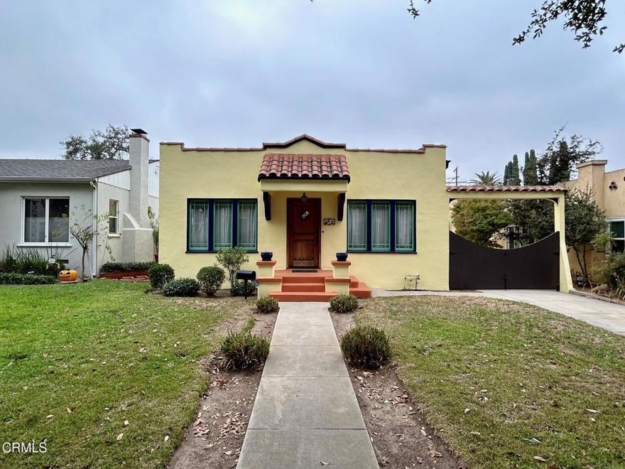 This charming 2-bedroom, 1-bathroom Spanish-style home is located on a tree-lined street in a beautiful neighborhood of Alhambra. A large front yard with a walkway will lead you into the home. This property has been freshly painted inside and out and features hardwood floors throughout. The living room offers a decorative fireplace with built-ins on each side, both bedrooms have custom closets with shelving and hanging options, and windows that make the space feel bright and open. The bathroom has beautiful Spanish-style tile on the wall and flooring and features a claw bathtub and shower, a pedestal sink, and a built-in medicine cabinet. The chef's kitchen has stainless-steel appliances including a new dishwasher, smoke hood and stove, refrigerator, quartz countertops, new cabinetry, and recessed lighting. There is a large, covered backyard/patio that is great for both eating and entertaining. Additional amenities include central air/heating and a one-car garage with a washer and dryer.