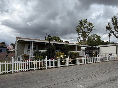 Photo of 29021 Bouquet Canyon Rd #317, Saugus, CA 91390 (MLS # SR26079409)