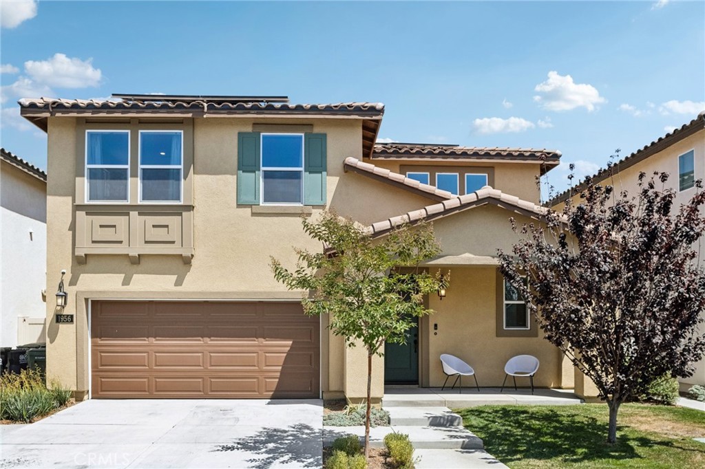 Welcome to this stunning 4-bedroom, 2.5-bathroom model home in the desirable gated community of Blossom Walk, Los Angeles. Built in 2022 on a quiet cul-de-sac, this fully upgraded residence combines modern design, smart home technology, and eco-friendly living with paid-off solar panels. Inside, you’ll find an open and airy floor plan filled with natural light, complemented by designer finishes throughout. The chef’s kitchen boasts a large quartz center island, stainless steel appliances, sink with a picturesque window, recessed lighting, and ample storage. The spacious living and dining areas flow seamlessly to one of the largest landscaped backyards in the community, perfect for entertaining, kids, or pets. Upstairs, the luxurious primary suite features a walk-in closet and a spa-inspired en-suite bathroom. Three additional bedrooms provide plenty of space for family, guests, or a home office. Upgrades include: built-in speakers with individual room controls, luxury vinyl plank flooring throughout, epoxy-coated garage floors, upgraded countertops, and enhanced flooring in the primary suite. Enjoy year-round comfort and energy savings with the home’s solar system, and take advantage of community amenities including a playground, BBQ area, shaded seating, and open lawn space. With only 29 homes in the community, Blossom Walk offers a private neighborhood feel while remaining conveniently close to the 110, 105, and 405 freeways, plus shopping and dining nearby.