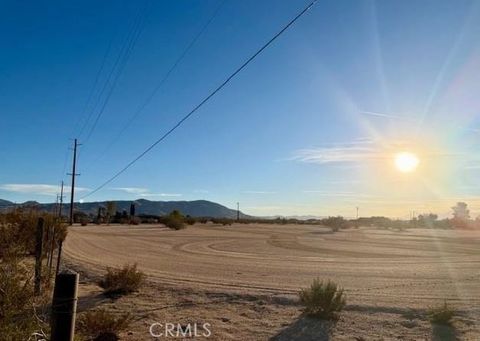 Photo of 23585 Bear Valley Rd, Apple Valley, CA 92308 (MLS # HD26074750)