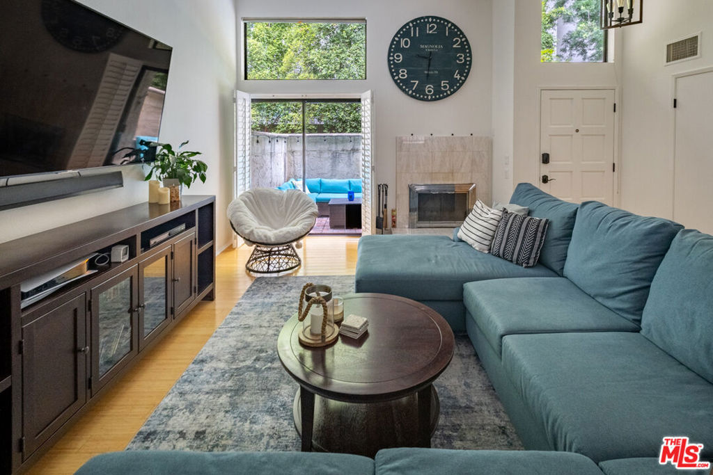 Welcome to a sophisticated urban retreat at 12831 Moorpark Street, Unit 14 in the heart of Studio City. This impressive 2-bedroom, 2.5-bathroom residence spans 1,286 square feet and offers an elegant blend of comfort and convenience.Step inside to discover a spacious, open living area bathed in natural light, enhanced by sleek hardwood floors and a tasteful skylight. The well-appointed kitchen features a cozy breakfast nook, perfect for casual dining or morning coffee. Relax and unwind in the bright living space, complete with a ceiling fan and air conditioning for optimal comfort.Enjoy your private outdoor space on the charming balcony, ideal for hosting intimate gatherings or savoring a quiet evening. Additional amenities include a powder room and in-unit washer/dryer for added convenience. For those who value accessibility, parking is included in the secure garage, and the property is pet-friendly.Take advantage of the community pool for a refreshing dip or explore the vibrant surroundings. Located just steps away from the shops at Sportsman's Lodge and the bustling array of restaurants and boutiques on Ventura Blvd, this lowrise, unfurnished gem offers the perfect blend of urban excitement and suburban tranquility. Embrace the lifestyle you deserve in this remarkable Studio City home.
