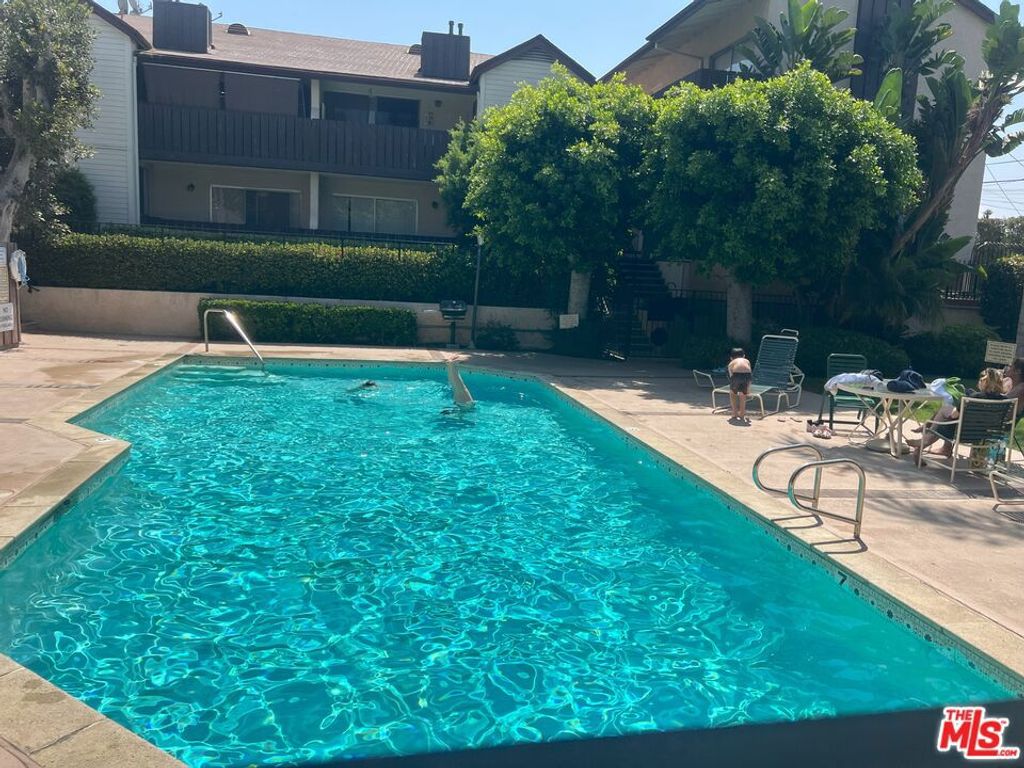 Photo of 15070 Victory Boulevard #103, Van Nuys, CA 91411 (MLS # 25567531)