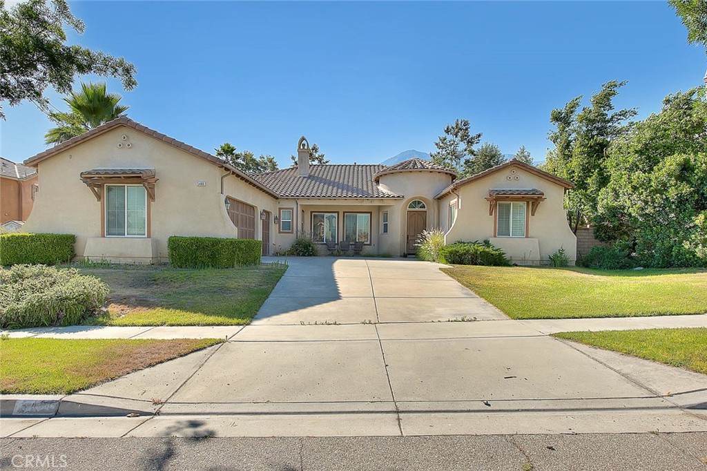 Nice Single Level Home in Rancho Cucamonga Situated on a Large Lot with an Open Inviting Floorplan Great for Entertaining. This Home Features Four Spacious Bedrooms, Three Bathrooms and 3395 Square Feet of Living Space. Formal Living Room with a Fireplace and Built in Bookshelves, a Separate Formal Dining Room and a Family Room with A Fireplace. Large Kitchen with Granite Counters, Stainless Steel Appliances Including a Gas Stove, Double Oven, Warmer, Built in Microwave, Dishwasher, Double Door Fridge and a Wine Fridge. Several Cabinets, a Desk, Walk in Pantry and a Veggie Sink. Breakfast Nook and Counter Bar. Huge Primary Suite with a Fireplace, Built in Shelving and a Primary Bathroom with a Walk in Closet, Vanity Area, Double Sinks, a Large Jetted Tub and a Separate Stall Shower. Indoor Laundry Room with Cabinets and a Sink. Some Rooms Feature Tray Ceilings and Crown Molding, 11' Ceilings and Wood Shutters Throughout Home. Three Car Attached Garage with Roll Up Door. Tile Flooring in Kitchen, Breakfast Nook, Bathrooms and Entry. Located in a Prime Neighborhood Close to Shopping, Schools & Freeways. The Home is Located on an Approximately 1/3 Acre Lot and was Built in 2007.