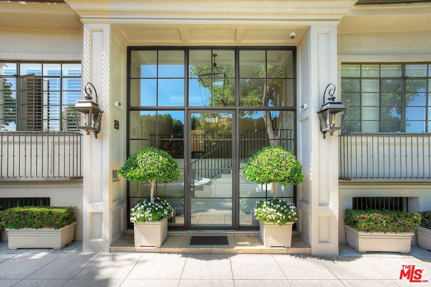 Experience refined living in the prestigious 9601 Charleville, designed by renowned architect Peter Choate and acclaimed designer Waldo Fernandez. This front-facing, tree-lined studio is just one block from the world-class shopping and dining of Beverly Hills' Golden Triangle. The residence blends classic sophistication with modern convenience, featuring dark hardwood floors, floor-to-ceiling windows, and elegant crown moldings. A chef's kitchen boasts Viking appliances and blue stone marble counters, while the bathroom is finished with timeless Carrara marble. Amenities include gated subterranean parking, full-sized storage, and wiring for cable, high-speed internet, and DirectTV. Residents also enjoy access to a beautifully appointed rooftop deck with sweeping city views, along with secure entry and monitored building access. A rare pied-a-terre that combines pristine quality, unmatched location, and timeless design.