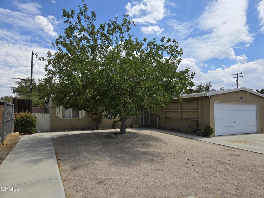 OPPORTUNITY IS KNOCKING . . . The tax records show this is a 3 bedroom home. At some point in the past an owner opened up the 3rd bedroom to expand the living room. A new owner might be able to return this home to a 3 bedroom thus adding value to the property. Buyer is responsible to check with the city and inspect permits. A great neighborhood close to schools, shopping and parks. A must see home.