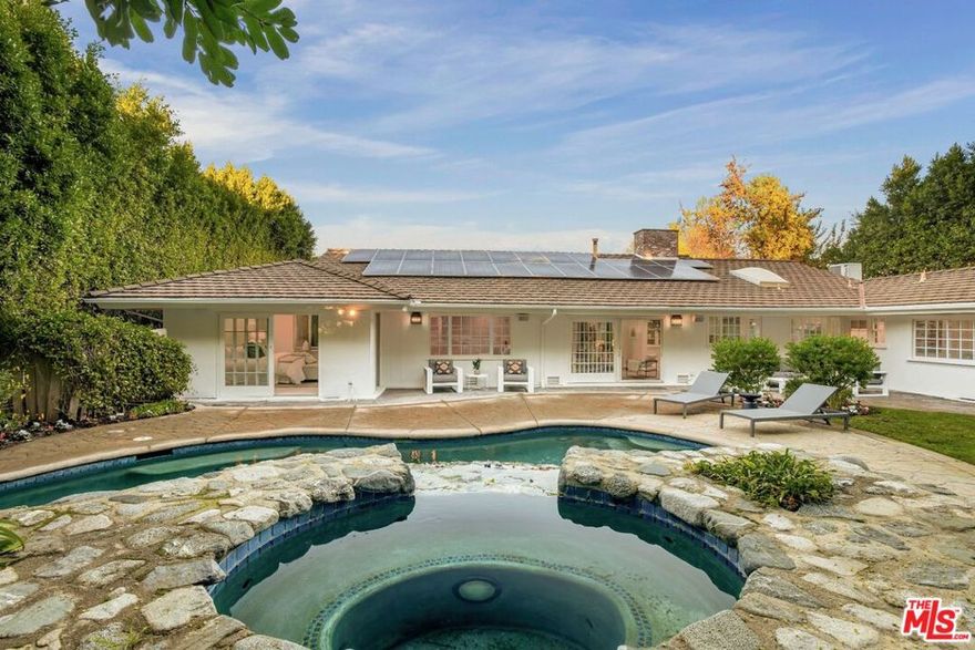 *ALL OFFERS DUE BY WEDNESDAY, 12/17 AT 2 PM* Welcome to this charming single-story traditional home, ideally located on one of Encino's most walkable and sought-after streets, just moments from the prestigious Royal Oaks neighborhood. Originally built in 1953 and filled with timeless character, this 4-bedroom residence offers a rare turnkey opportunity at this price point in such a prime location. Step inside to discover bright, welcoming interiors with brand-new carpet and an easy, comfortable layout designed for everyday living. The spacious living and dining areas flow effortlessly to the private backyard--your own outdoor oasis--featuring a sparkling pool perfect for relaxing weekends and warm California evenings. The property includes a 2-car garage along with generous driveway parking, offering convenience and functionality that's hard to find in the area. Whether you're envisioning your first home in Encino or a beautiful retreat to grow into, this residence combines traditional charm, unbeatable walkability, and exceptional value. A truly special find--don't miss the opportunity to make it yours.