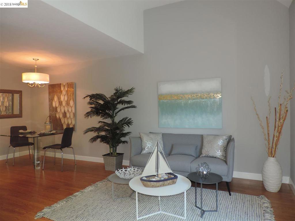 Wonderful private treesy setting. All remodeled interior, new appliances, new bathroom fixtures and fittings, just painted, new lighting fixtures. Very convenient to gym, pool and elevator. Complex has resort amenities of pool, tennis courts, gym on almost 10 acres with guest parking. Walk to ferry, convenient to 2 BART stations, Amtrak. EZ shuttle to Pill Hill. Walk to many restaurants, Farmers Market, movie theatre. Dynamite area close to Brooklyn Basin. Most importantly the seller has paid the assessment so HOA dues are not over $700 but $408! Building is VA/FHA approved. Walk to Chinatown, Starbucks and many restaurants and coffee shops. Complex in process of being renovated. See disclosure package for details/contacts. Affordable housing on waterfront--doesn't get much better with present and future potential!
