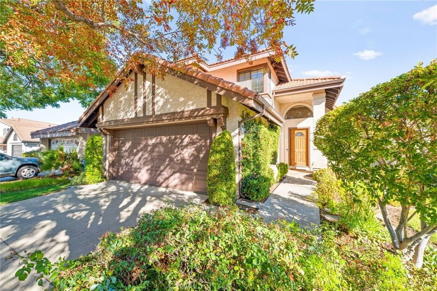 Location, Location, Location! This well-maintained Rancho Cucamonga home is centrally located near the famous Victoria Gardens shopping center.  The home boasts a custom wood floor, 3 large bedrooms, 2 1/2 baths, a separate formal living room with a large dining room, a family room to enjoy the impressive mountain views while watching tv or cooking at the open space kitchen.  The kitchen has a beautiful layout with a breakfast island style and an additional section for a coffee table to continue enjoying the mountain views.  The master bedroom on the upstairs has a very large window to allow ample lighting into the home and serene ambiance. The exterior view has a wow effect.   Enjoy the green trees and well thought exterior landscaping.  Come take a look!!