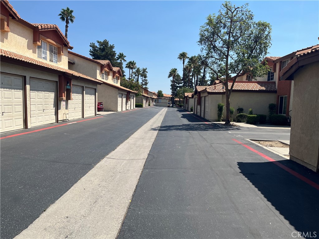 Freshly remodeled condo in gated community with a DIRECT ACCESS 1 car garage and an EXTRA PARKING SPOT DIRECTLY IN FRONT OF THE CONDO. Inside features include NEW Quartz Countertops and NEW Luxury Vinyl Plank flooring. Water, Trash and Building Insurance are included in your HOA dues. HOA amenities include a Heated Pool and Spa and 24 hour guard service.