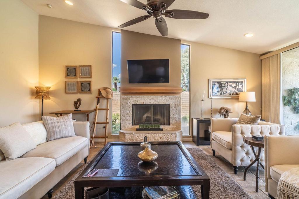 This completely renovated property is located in Dorado Villas, the most desirable area of Indian Wells, directly across from The Vintage Club and El Dorado Country Club. The home is meticulously decorated, offering a warm and welcoming atmosphere that instantly makes you feel at home.The open floor plan includes a formal living room, formal dining area, and a full wet bar with a wine refrigerator, all flowing seamlessly out to the back patio, which overlooks a lush greenbelt and tennis courts. The informal dining area is attached to the kitchen and separated by an additional bar, making it ideal for casual meals or entertaining.Step outside to a beautiful outdoor dining area next to the BBQ, where you can enjoy meals while taking in the scenic views of the tennis courts and surrounding desert landscape. Two comfortable seating areas are also available for relaxing or hosting guests.Each bedroom offers direct access to a private patio and en-suite bathroom, providing comfort and privacy for all. The primary bedroom features extra-large walk-in closets and a private, beautifully landscaped patio--perfect for relaxing and enjoying the views.The gated community of Dorado Villas features numerous tennis courts, swimming pools, spas, and expansive green spaces, all designed for residents to enjoy a resort-like lifestyle.Located within walking distance to restaurants, shopping centers, grocery stores, and coffee shops, and just minutes away from the world-famous Indian Wells Tennis Garden, this property offers the perfect blend of luxury, convenience, and comfort.Price is base on a long term lease.CALL LISTING AGENT SEASONAL PRICE.