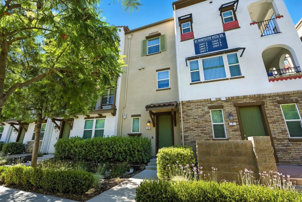 Welcome to 85 Montecito Vista Drive, Unit 6, a chic urban sanctuary in the heart of San Jose! This 3-story condo blends style and function with 2 bedrooms, 2.5 bathrooms, and a versatile floor-plan. The open concept living and kitchen area is perfect for entertaining, showcasing shaker cabinetry, stainless steel appliances, and a gas range. A powder room and in-unit laundry add convenience to daily living. Multiple balconies provide peaceful spots to relax and upstairs you'll find two spacious bedrooms with generous closets. The primary suite features a double vanity and large shower, while the secondary bath offers a shower/tub combo. Practical perks include a tandem 1-car garage with two Tesla battery units and a work area, central AC & heat, smart blinds, and abundant natural light throughout. Set in a well-maintained community with a playground and open spaces, this home also offers easy access to Monterey Road and major commuter routes. Stylish, smart, and move-in ready, don't miss your chance to call this one home!