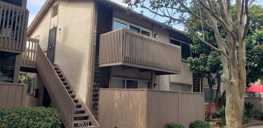 Lovely Condominium with laminated floors, granite counter top, gas stove, garbage disposal, dishwasher, central air conditioning, central heating. Two swimming pools, jacuzzi. One  carport, plenty parking area, laundry area. Surrounded by green gardens plenty trees and plants.   Close to shopping centers, freeways 5, 55. Quite community. Nice area.